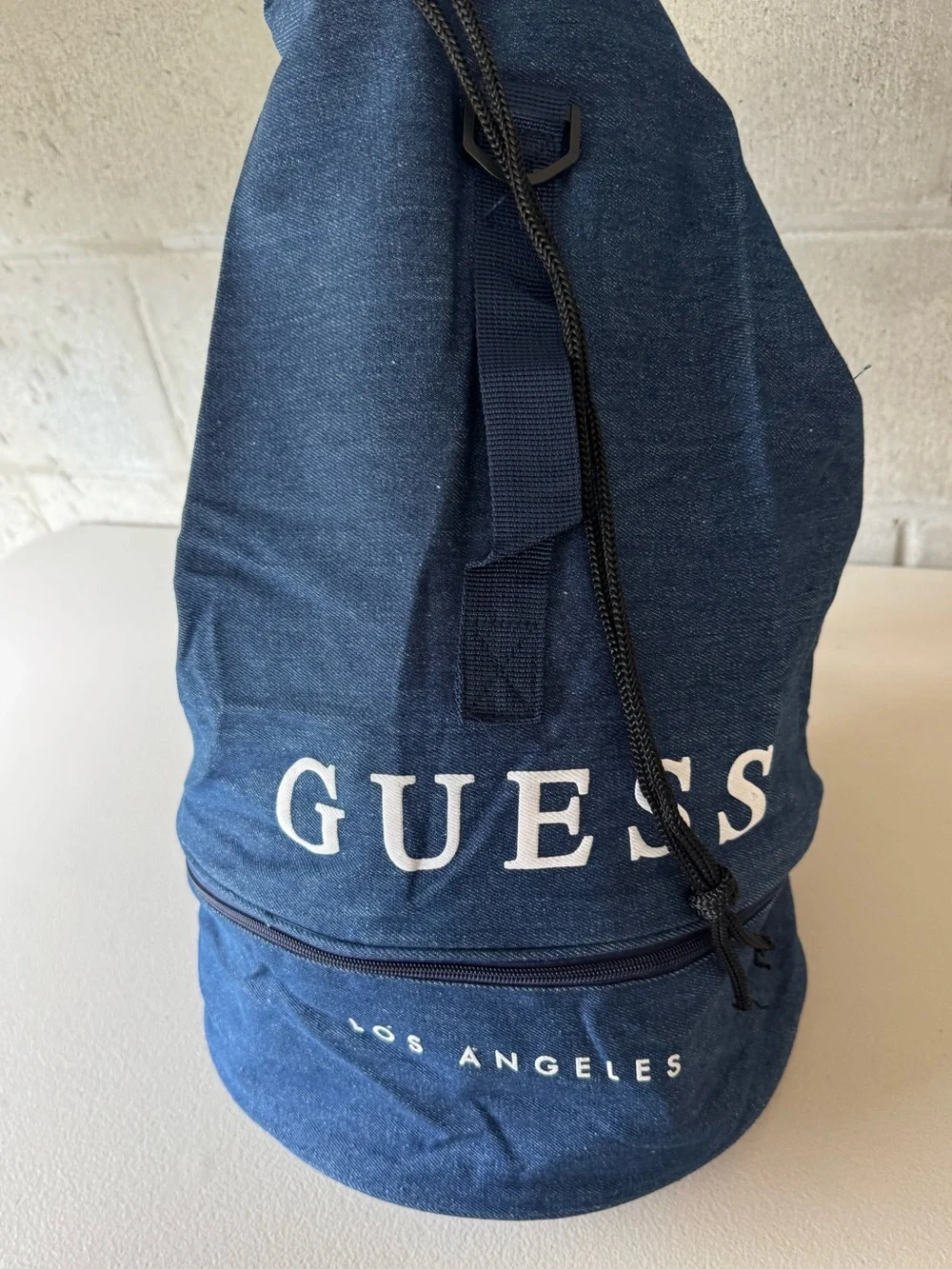 GUESS Denim Large Navy Drawstring Duffel Bag with Zippered Base